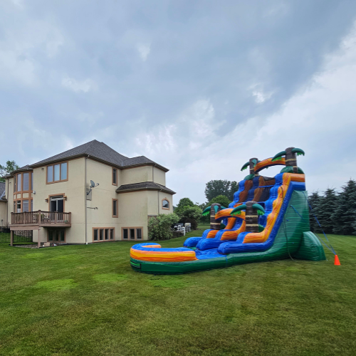 Waterslide rental next to a mansion