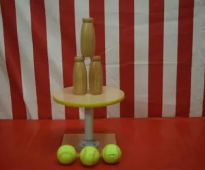One Ball Table with Wooden Bottles scaled e1675706594779 1 How to Plan a School Carnival Everyone Will Remember